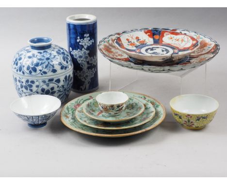 An Imari charger, 12" dia, a similar smaller dish, three Canton enamel dishes and other Oriental ceramics 