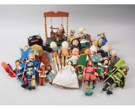 Two Grodnertal dolls, a Chad Valley Golly, 13 1/2" high, and various other dolls 