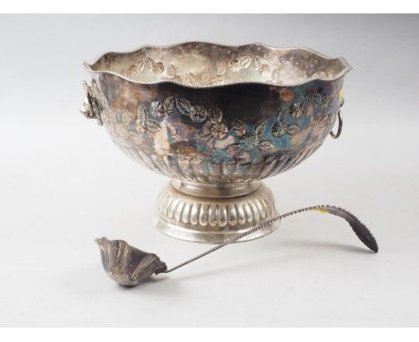 A plated and embossed punch bowl and ladle 