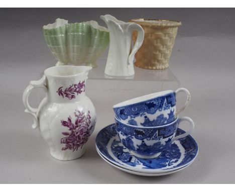 Eight pieces of Royal Worcester china, including an 18th century style cream jug with floral decoration and mask spout, 5" hi