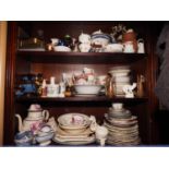An assortment of ceramics, including a pink lustre coffee pot (damages), plates, teawares,