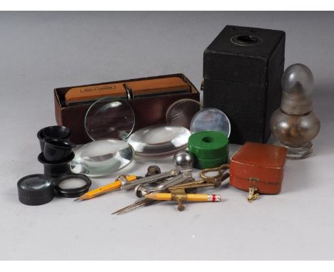 A Zeiss Ikonphot light meter, in case, a Coronet Xcel box camera, a number of lenses and an Ulmia pulling blade 