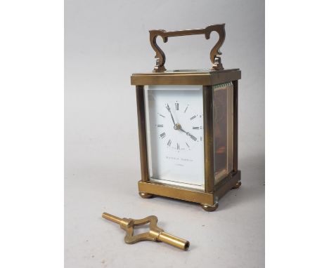 A Matthew Norman brass and glass cased carriage clock, 5" high 