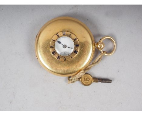 A Dent 18ct gold cased half hunter pocket watch, key would movement 24707, in leather travelling caseGross weight: 104.4gDiam