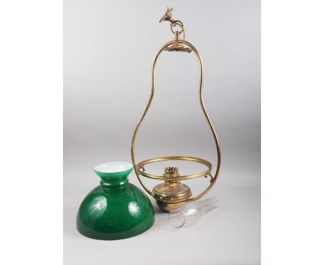 An early 20th century brass hanging oil lamp with green glass shade and chimney, 30" high (damaged chimney) 