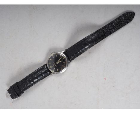 A gentleman's Eterna-Matic stainless steel wristwatch with black enamel dial and baton numeralsCondition:The watch runs but w