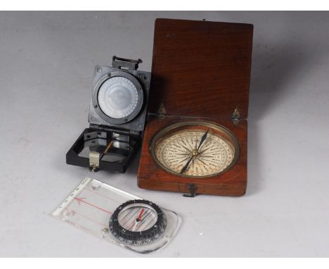 An 18th century mahogany cased compass with paper "dial", a "Compass Magnetic Marching Mark I", in Bakelite case, and a Silva