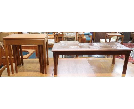 A mid 20th century teak McIntosh nest of three tables on square chamfered supports, 53cm high x 54cm wide x 37cm deep and a m