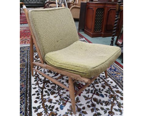 A mid 20th century elm and beech Ercol 427 lounge chair with green upholstered cushions, 75cm high x 55cm wide x 72cm deep Co