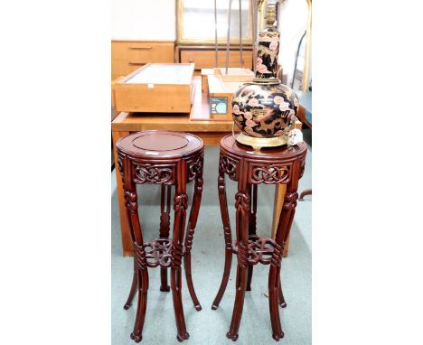 A pair of 20th century Oriental hardwood two tier plant stand, 77cm high and a ceramic Oriental style table lamp (3) Conditio