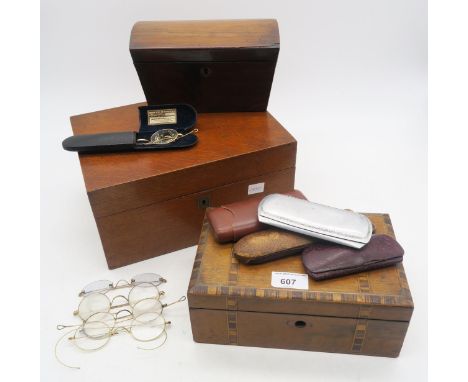 A small rosewood dome-top tea caddy, silk-lined oak sewing box and a Tunbridge ware stationary box with internal printed labe