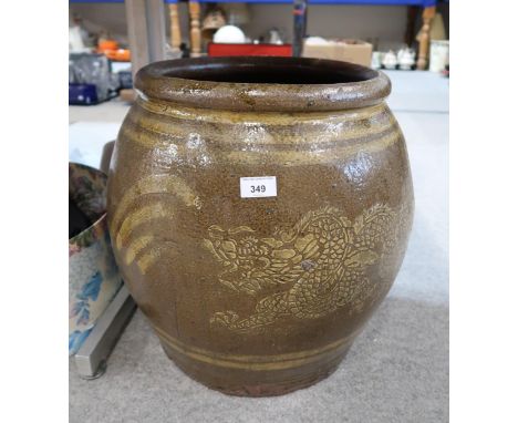 A large Chinese waterpot/planter decorated with a dragon Condition Report:Available upon request