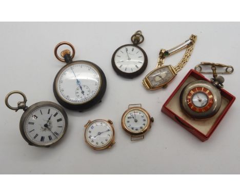 Three 9ct gold cased ladies vintage watch heads, one with a gold plated strap, weight all together with strap and mechanisms 