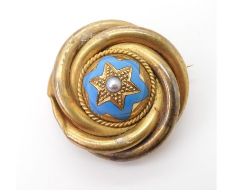 A Victorian yellow metal pearl and enamel star brooch, diameter 3cm, weight 11.1gms Condition Report:Available upon request