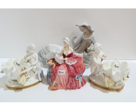 A pair of Moores cherub dishes, a Doulton figure and a Nao figure&nbsp; Condition Report:Doulton cracked