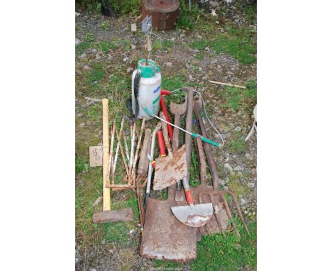 A garden sprayer, 'Wolf' log splitter garden tools, and croquet hoops.