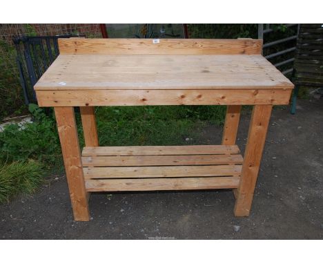 A potting table with lower shelf - 4' wide x 21" depth x 34" high.