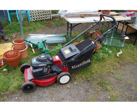 A Mountfield mower with 4.5 Honda engine and grass box - working order.