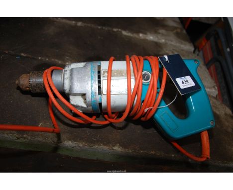A 'Wolf' tools electric hand drill.
