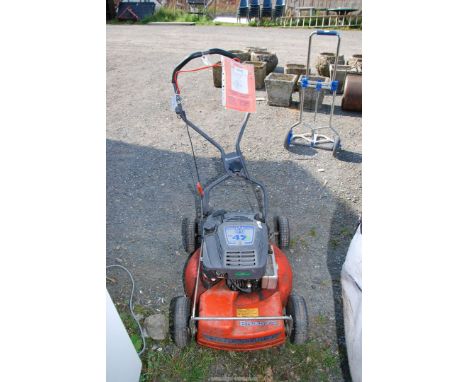 A 'Husqvarna' mower - engine turns.
