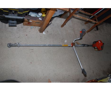 A 'Husqvarna' strimmer with no head - engine turns.