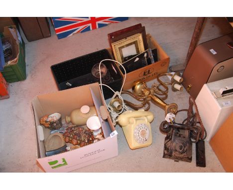 Two boxes of  two old phones, ceiling light, china ornaments and photo frames.