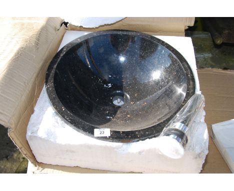 A boxed circular black with gold flecks granite basin - 17" diameter.