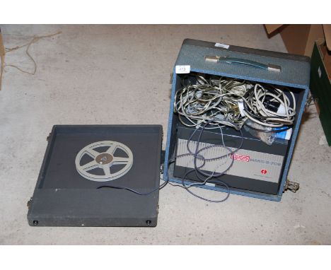 A 'Eumig Mark-S-709' cine projector with speakers.