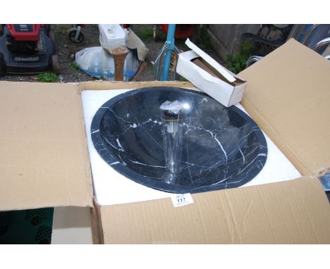 A circular marble wash basin - 17" diameter. 