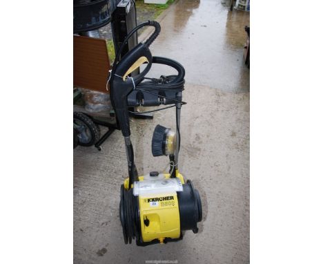 A K'ärcher power washer with a rotary brush - working order.