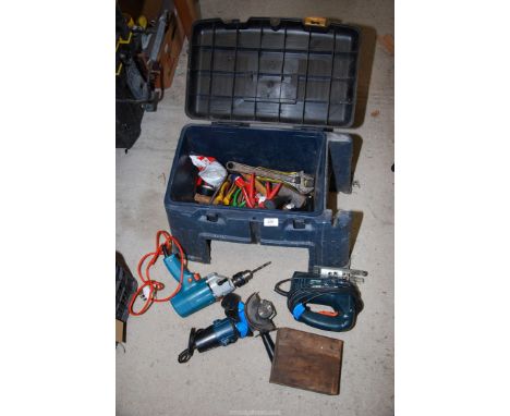 A tool chest with 'Black & Decker' electric drill, a 4" angle grinder, and jigsaw, etc.