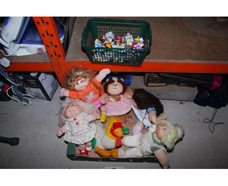 A variety of toys including a Merrythought chicken, Cabbage patch dolls and Macdonalds toys.