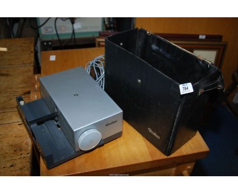 A cased 'Rollei' projector.