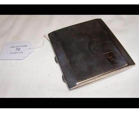 A gent's silver cigarette case with engine turned decoration 