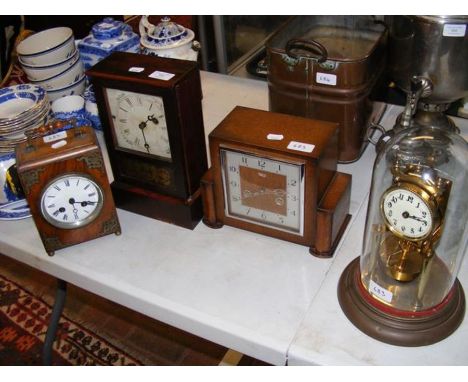 An American mantel clock together with others