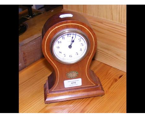 An American New Haven Clock Co. mantel clock in 'balloon' form 