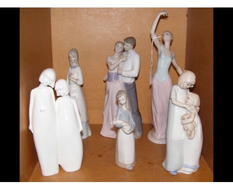 A medley of Lladro, Royal Doulton and Nao figures 