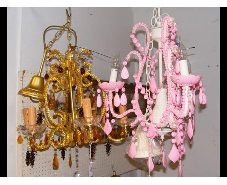 A decorative modern ceiling light and one other