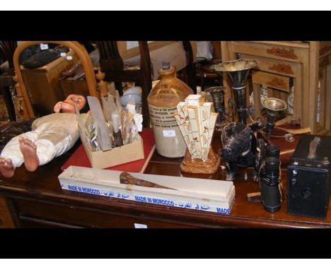 An eclectic lot of collectables, including a vintage chimpanzee toy, a Myott, Son &amp; Co. Art Deco vase and stamps, etc.
