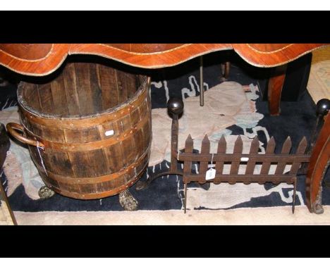A coopered coal barrel, together with a cast iron fireguard 