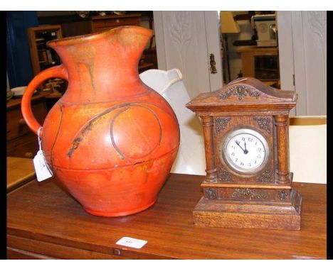 A Wesuma ware vase inscribed to base W. Lemon &amp; Son, together with an oak miniature mantel clock 