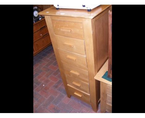 A light oak tallboy chest of drawers - width 53cm 
