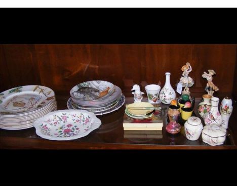A medley of collectable plates and ceramics, including Carlton ware butter dish and knife, Goebel cruet set and Wedgwood 'Wil