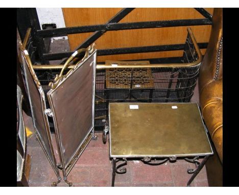 A brass footman, fireguard, etc. 