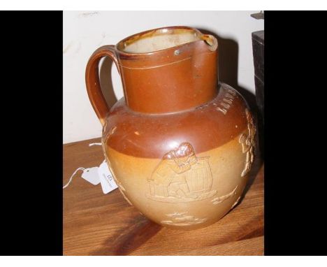 A Doulton Lambeth stoneware jug inscribed L &amp; S W R - 22cms high