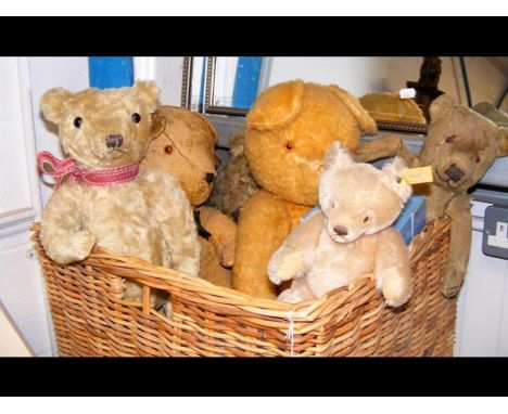 A basket of vintage bears, including a small Steiff Bear and Merrythought 'Titanic' Bear in box 