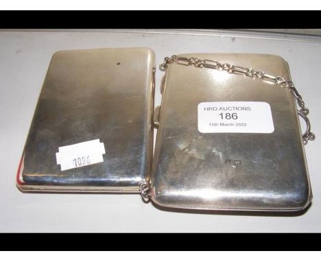 A silver cigarette case together with one other