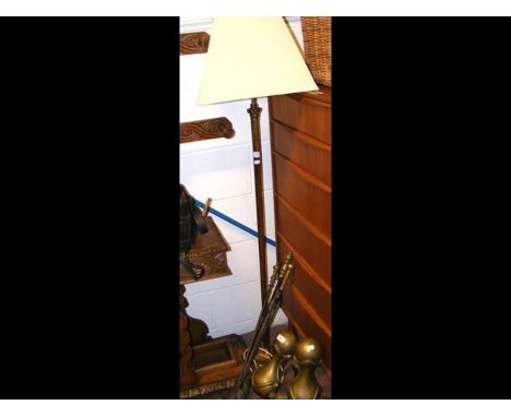 A brass standard lamp 