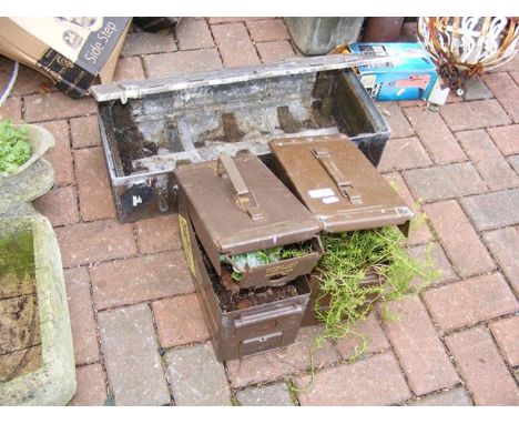 Three ammunition boxes - two with plants
