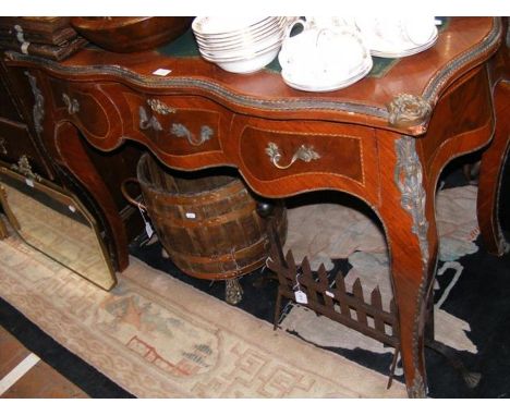 An ornate writing desk with green leather inset to top - width 116cm CONDITION REPORTIn our judgement, condition of lot is fa